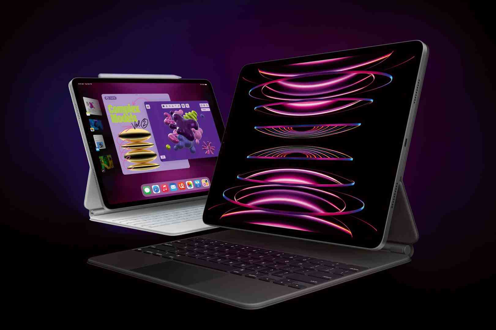 two ipads are displayed against a dark background the left ipad shows a colorful interface with apps while the right ipad features vibrant abstract graphics on its screen both are positioned with keyboards attached digital production Two iPads are displayed against a dark background. The left iPad shows a colorful interface with apps, while the right iPad features vibrant abstract graphics on its screen. Both are positioned with keyboards attached.