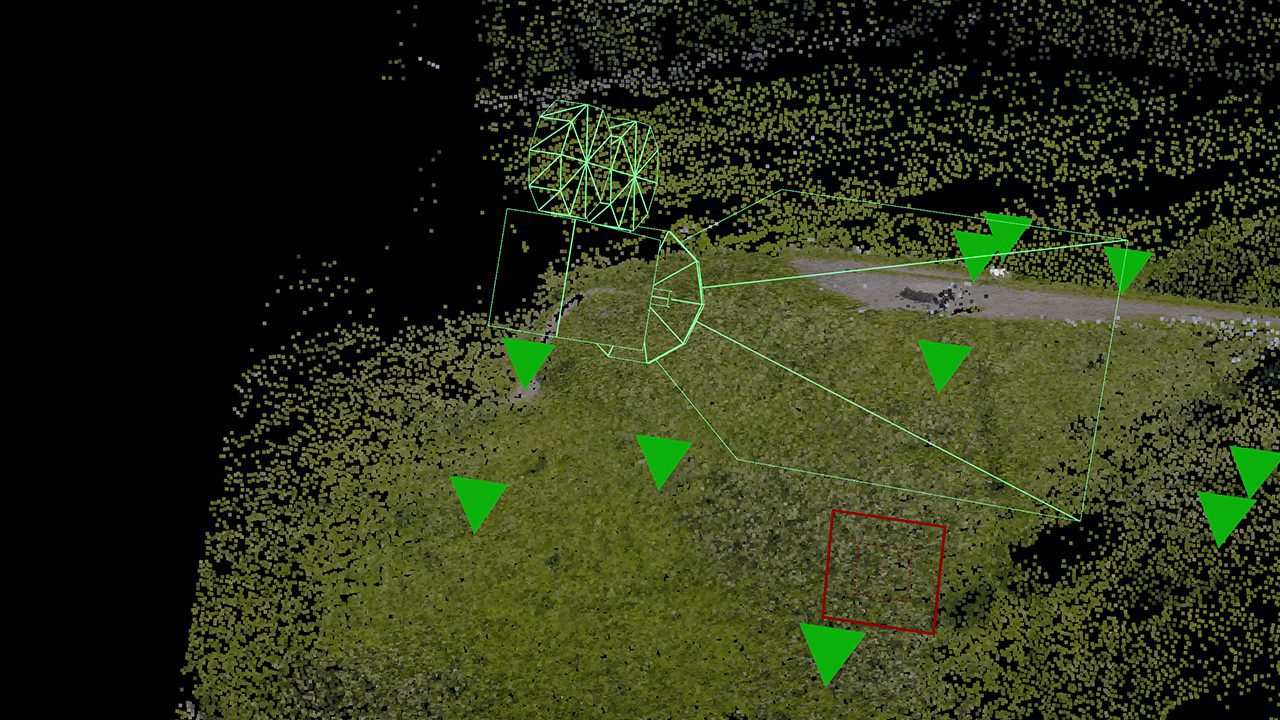 aerial view of a terrain analysis featuring green triangular markers and geometric shapes indicating data points and measurements on a grassy area with a roadway digital production Aerial view of a terrain analysis, featuring green triangular markers and geometric shapes indicating data points and measurements on a grassy area with a roadway.