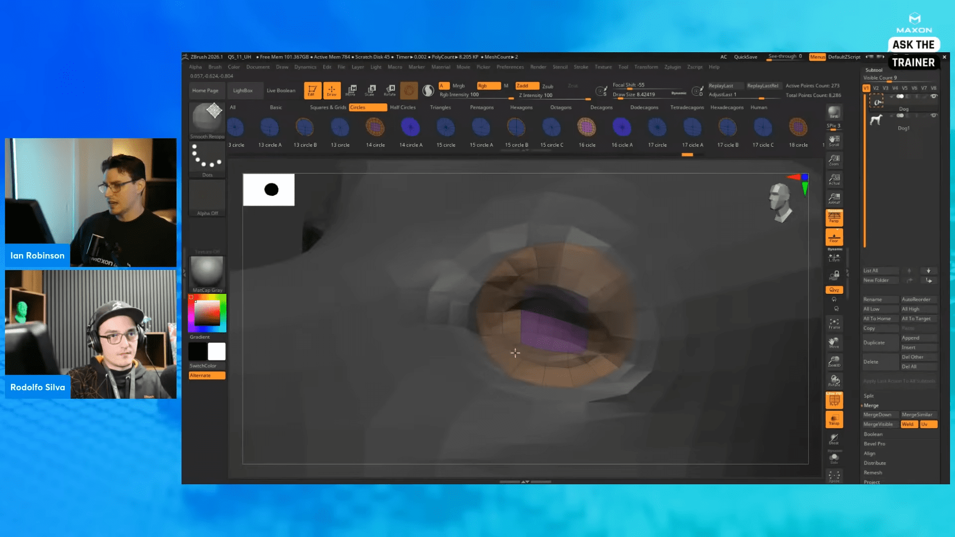 two digital artists engaged in a tutorial session one artist is demonstrating on a computer screen showcasing a 3d modeling software interface while the other artist observes and takes notes the workspace features various color palettes and tools digital production Two digital artists engaged in a tutorial session. One artist is demonstrating on a computer screen showcasing a 3D modeling software interface, while the other artist observes and takes notes. The workspace features various color palettes and tools.
